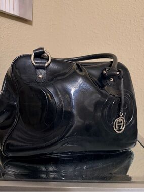 Etienne Aigner Black Patent Leather Satchel with Silver Logo Charm